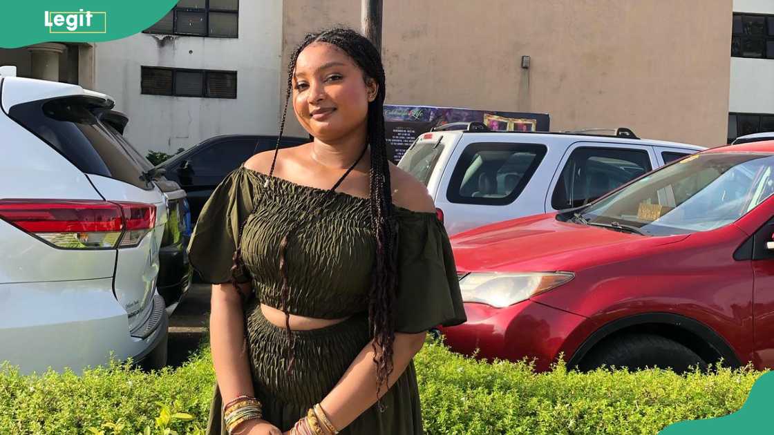 Chidinma Oguike in a parking lot on a sunny day Chidinma Oguike in a parking lot on a sunny day