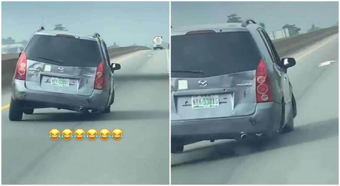 Photos of a Mazda car spotted running with only 3 wheels. Photos of a Mazda car spotted running with only 3 wheels.