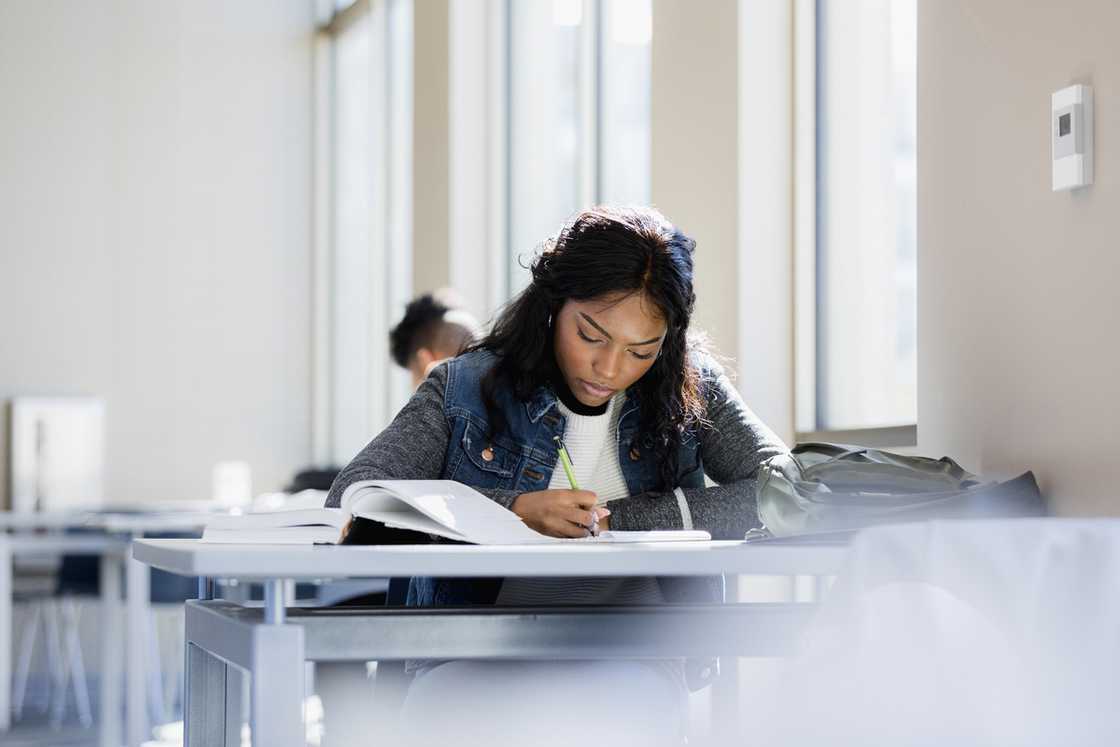 A student studies in a library.