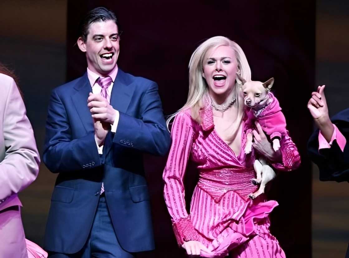 Laura Bell Bundy and Christian Borle dance during a performance