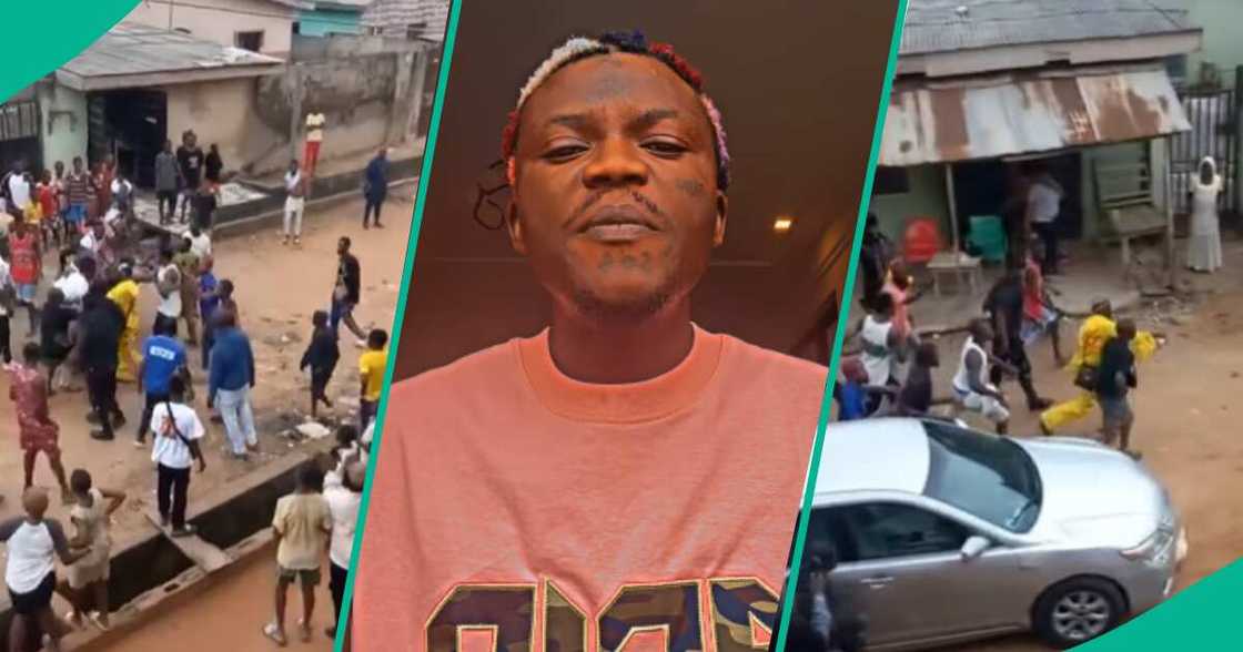 Watch trending video of Portable fighting Alagbado boys on the streets after his phone was stolen