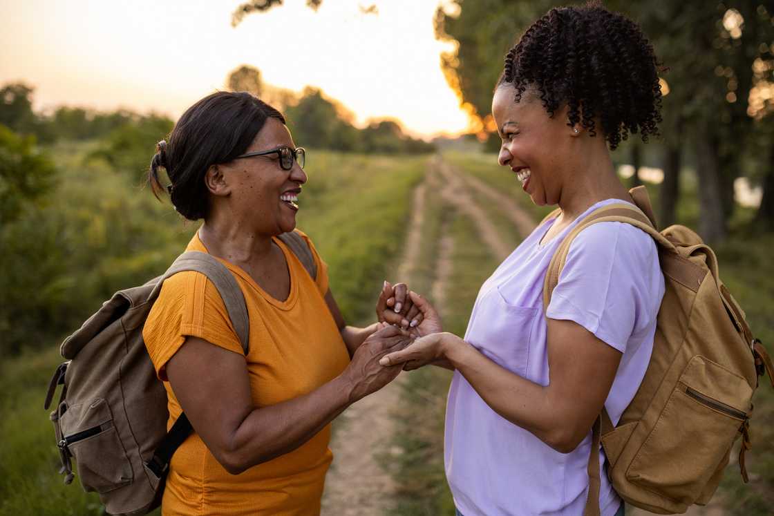 A mother and daughter laughing
