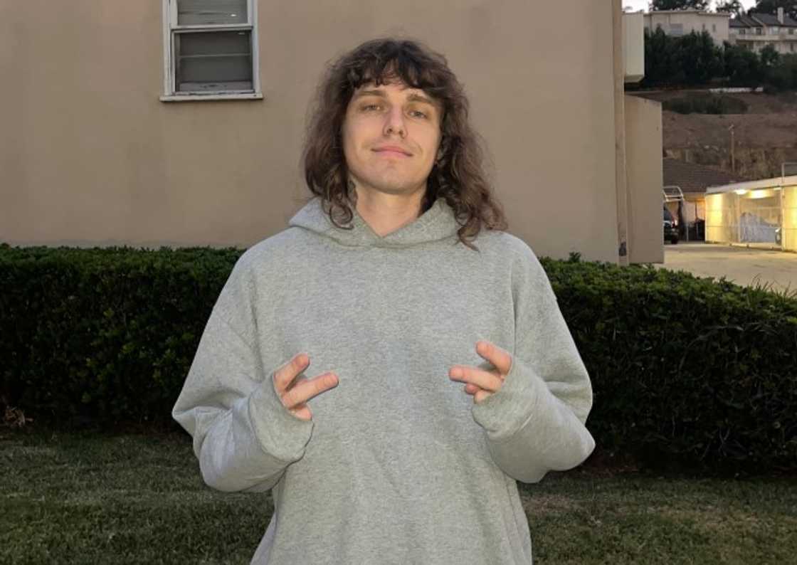 Australian rapper Allday poses outdoor Australian rapper Allday poses outdoor
