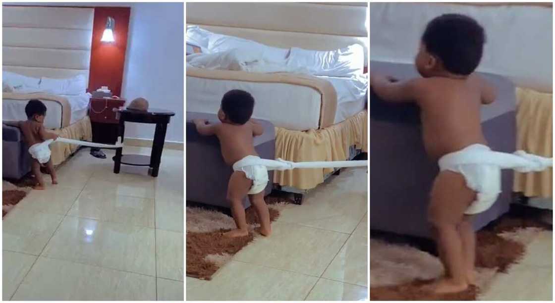 Photos of a Nigerian baby restrained with a rope by his father.