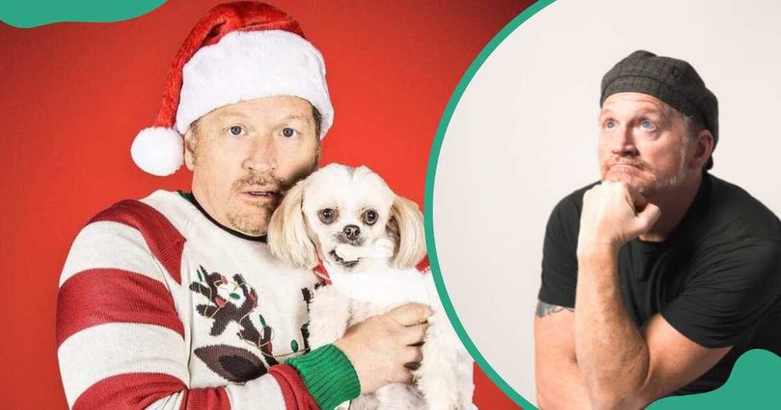 Tim Hawkins poses with a dog against a red background. The comedian poses, sitting.