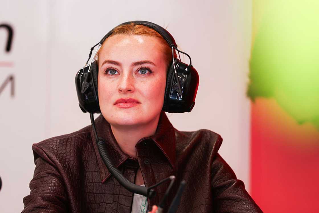 Amelia Dimoldenberg looks on in the Haas F1 garage