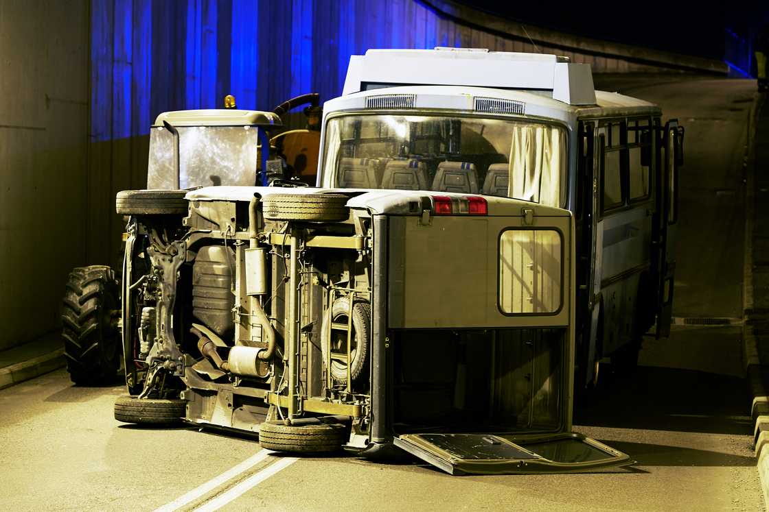 A trailer and bus accident at night A trailer and bus accident at night