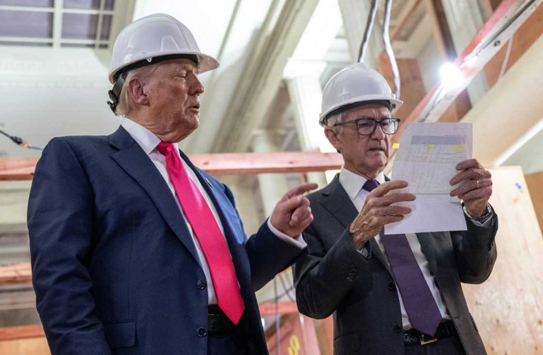 Donald Trump (L) has ramped up pressure on Federal Reserve Chair Jerome Powell (R) as the US president pushes for lower interest rates Donald Trump (L) has ramped up pressure on Federal Reserve Chair Jerome Powell (R) as the US president pushes for lower interest rates