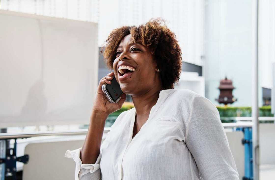 A lady speaking on the phone