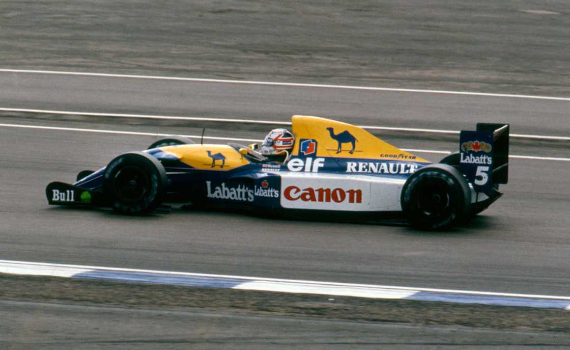 Nigel Mansell competes in a Williams Renault FW14B