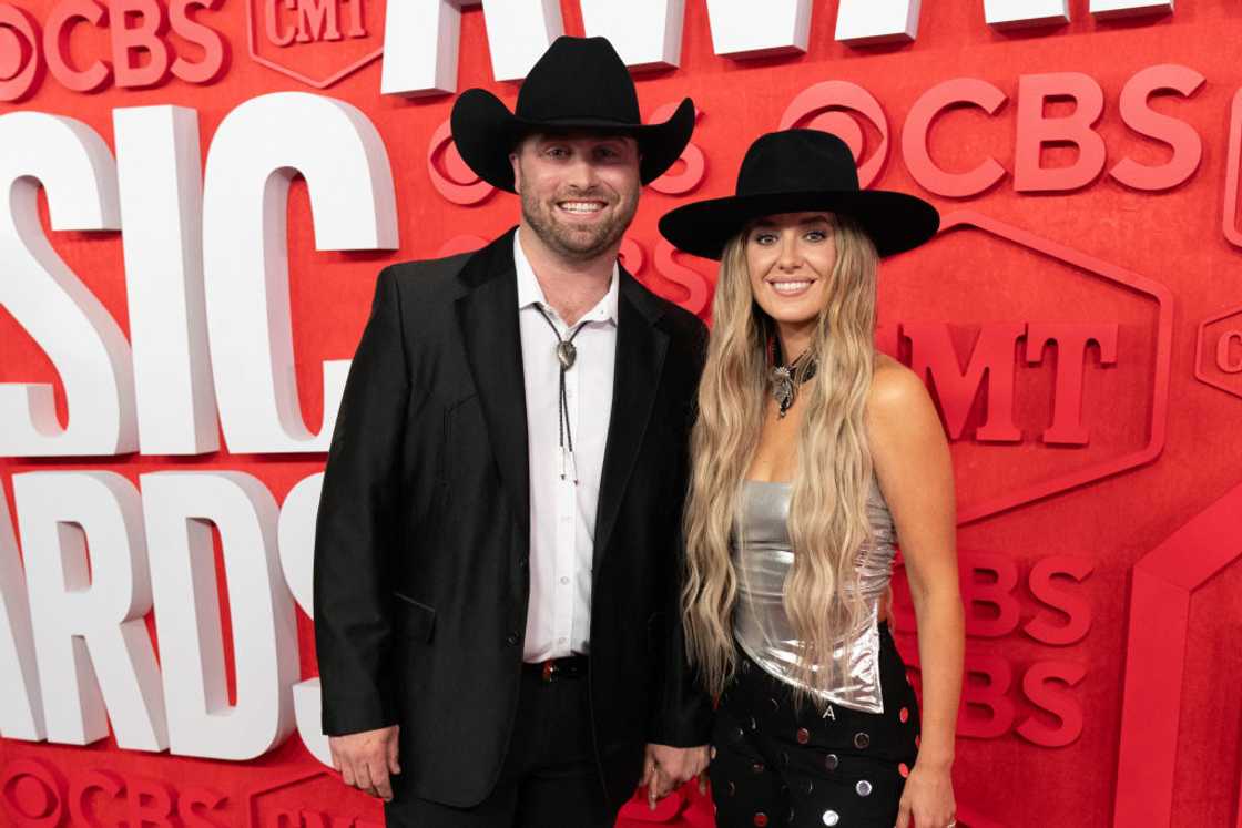 Lainey Wilson and Devlin "Duck" Hodges pose at the 2024 Country Music Television (CMT) Awards