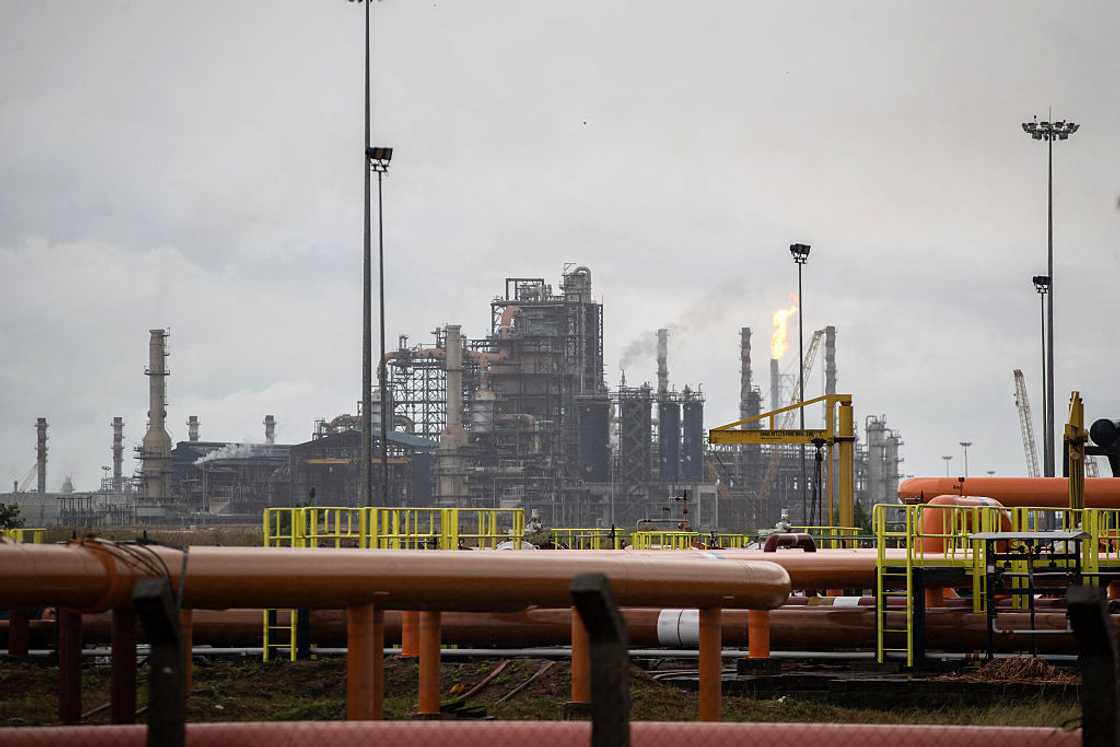 Tall steel towers, pipes and processing units of the Mild Hydrocracking Unit at the Dangote petroleum refinery in Ibeju Lekki, Lagos, 2026
