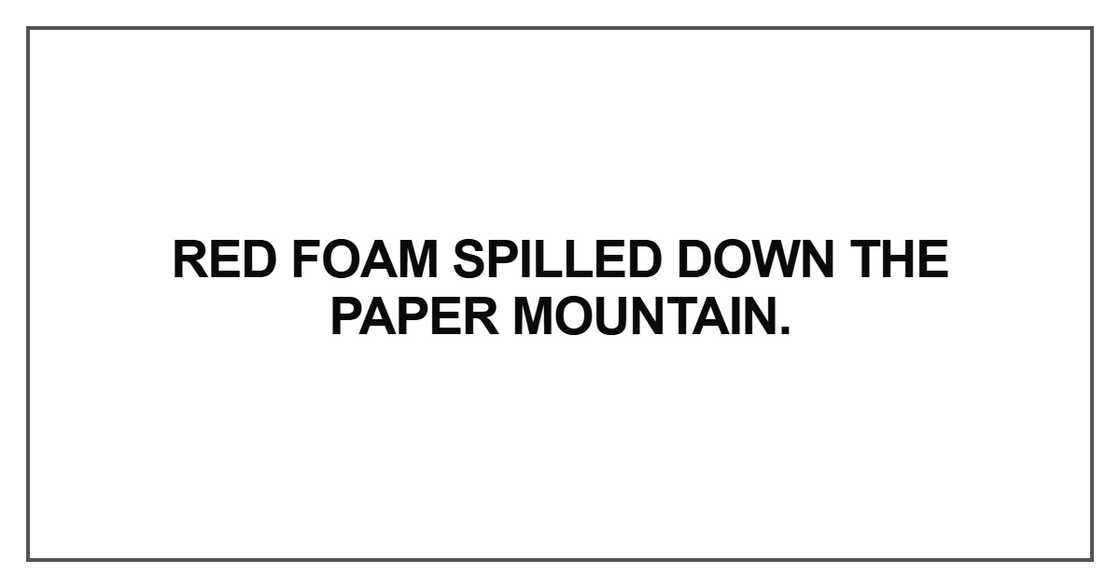 Red foam spilled down the paper mountain