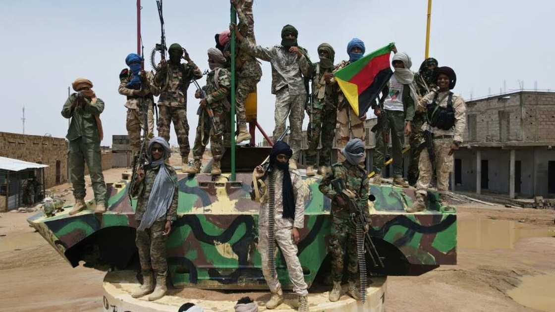 Fighters from the National Movement for the Liberation of Azawad (MNLA), part of the CMA alliance, pose for a picture during the August talks Fighters from the National Movement for the Liberation of Azawad (MNLA), part of the CMA alliance, pose for a picture during the August talks