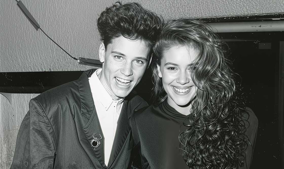 Corey Haim and Alyssa Milano pose together at a St. James Club party Corey Haim and Alyssa Milano pose together at a St. James Club party