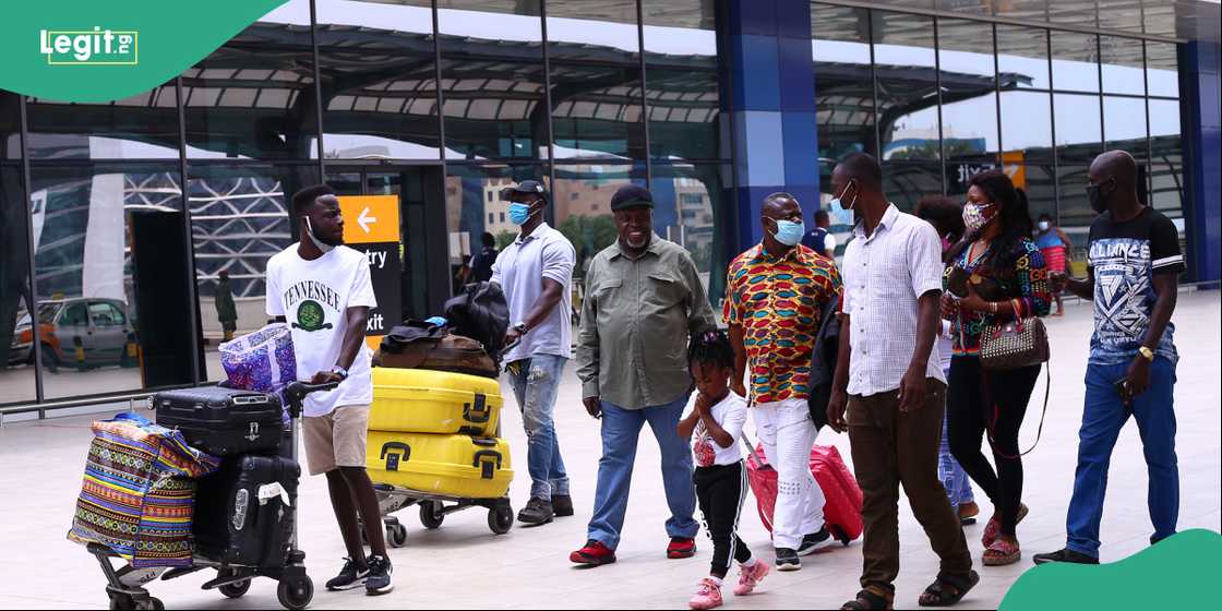 Ghanaians land at the airport in Accra