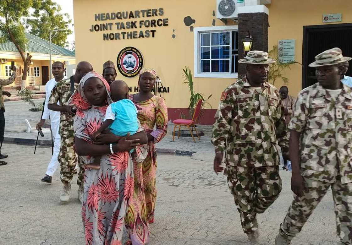 Chibok schoolgirls Hauwa Joseph (L) and Mary Dauda (R), both had children with them