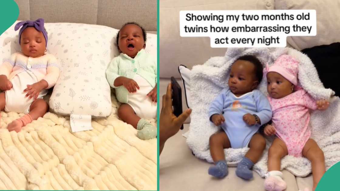 Mum shows off her twin babies.