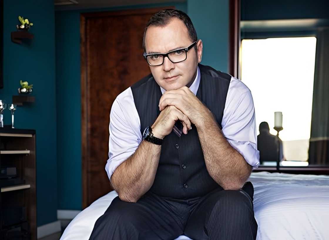 Christopher Ciccone poses indoors for a photoshoot