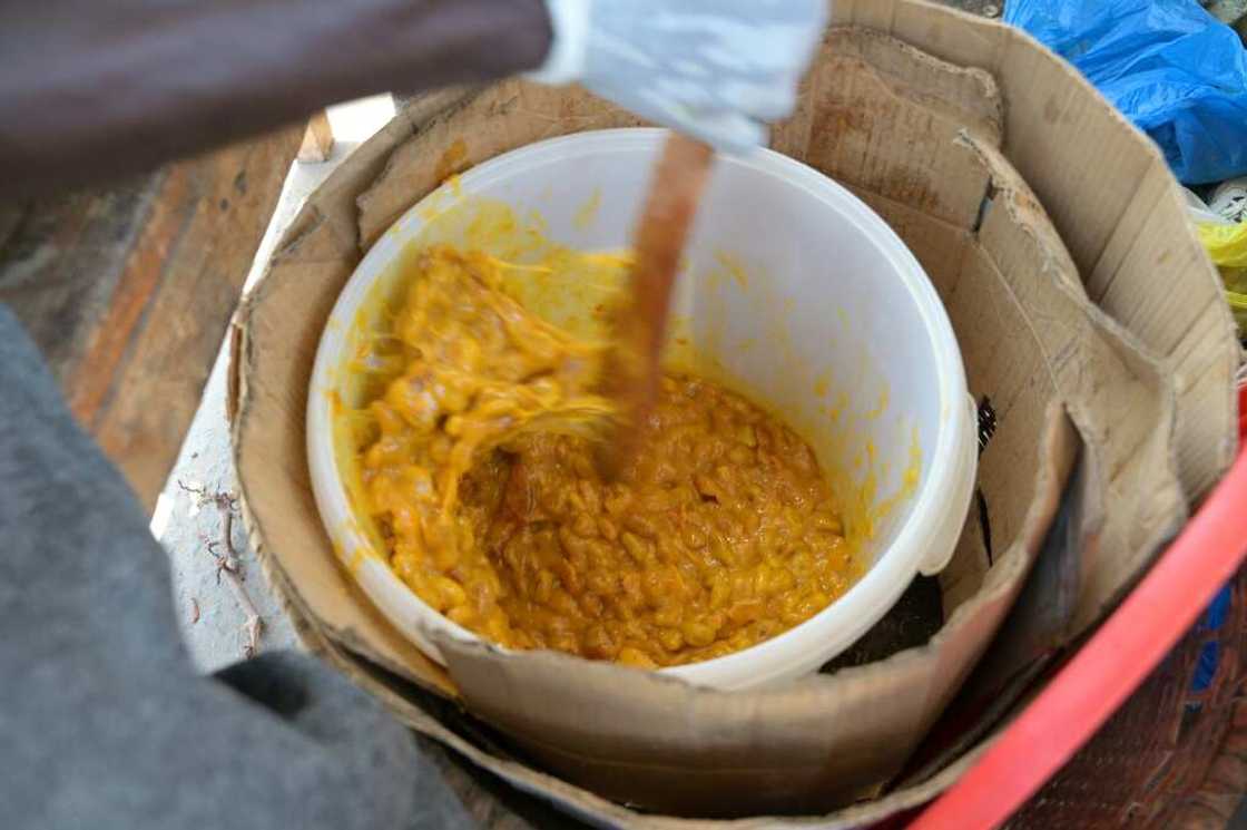 Maad pulp being blended into a compote. Senegalese eat the delicacy with salt, sugar or chilli and sometimes consume it as jam or juice Maad pulp being blended into a compote. Senegalese eat the delicacy with salt, sugar or chilli and sometimes consume it as jam or juice