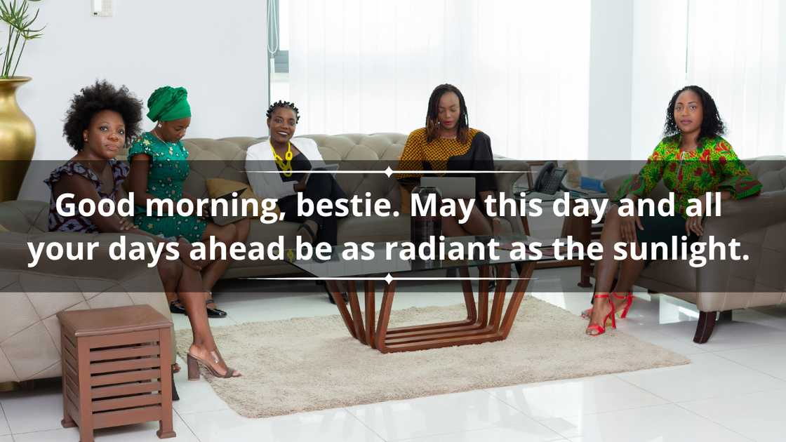 A group of women sitting on a couch as they converse