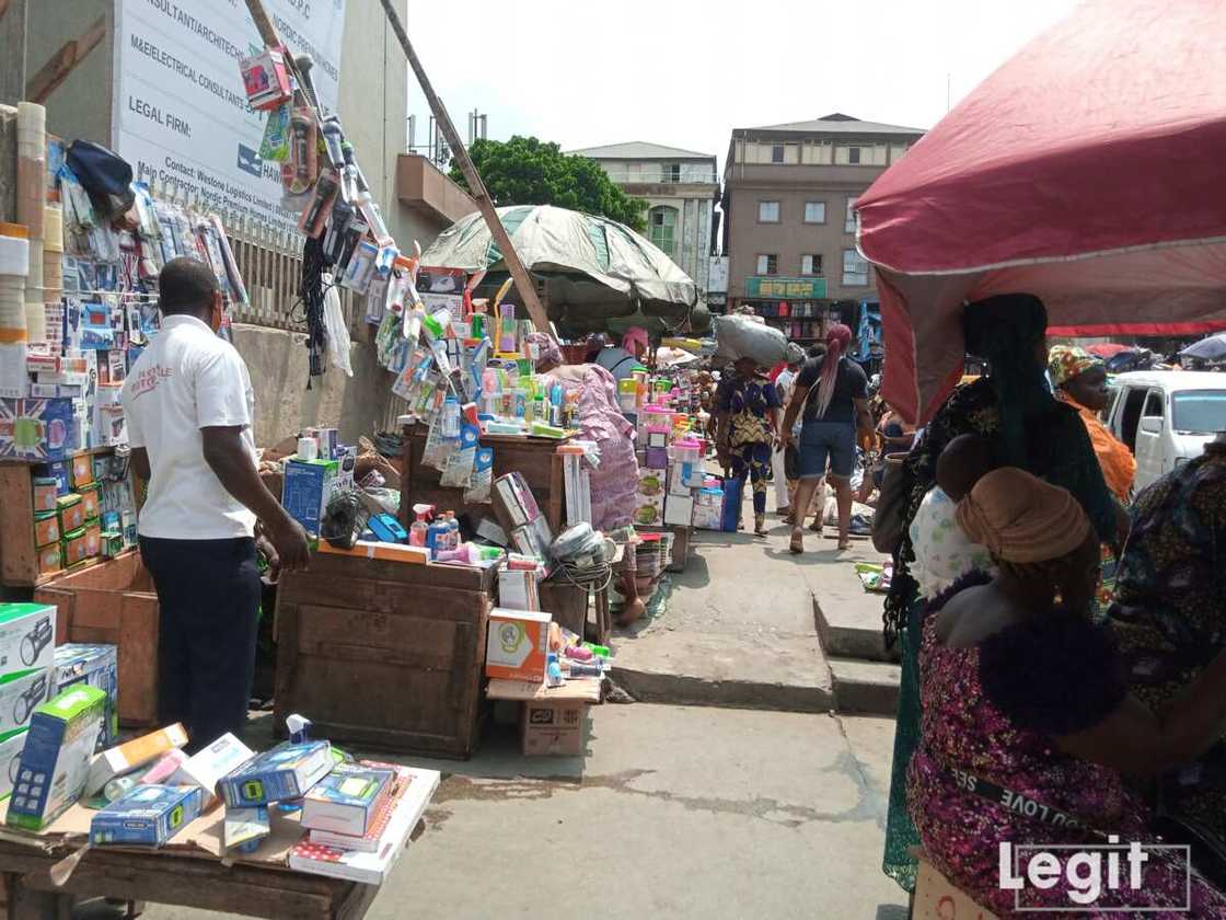 Torchlight, tape and other items on display in popular Lagos market. Photo credit: Esther Odili Torchlight, tape and other items on display in popular Lagos market. Photo credit: Esther Odili