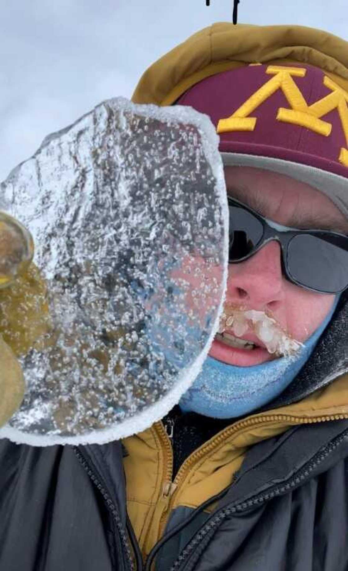 Glaciologist Peter Neff holds a fragment of Antarctic ice containing 100,000-year-old air bubbles Glaciologist Peter Neff holds a fragment of Antarctic ice containing 100,000-year-old air bubbles