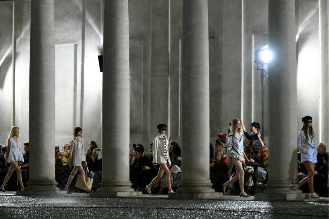 many models wore just swim briefs, shorts were rolled up and mini dresses became open-backed t-shirts. many models wore just swim briefs, shorts were rolled up and mini dresses became open-backed t-shirts.