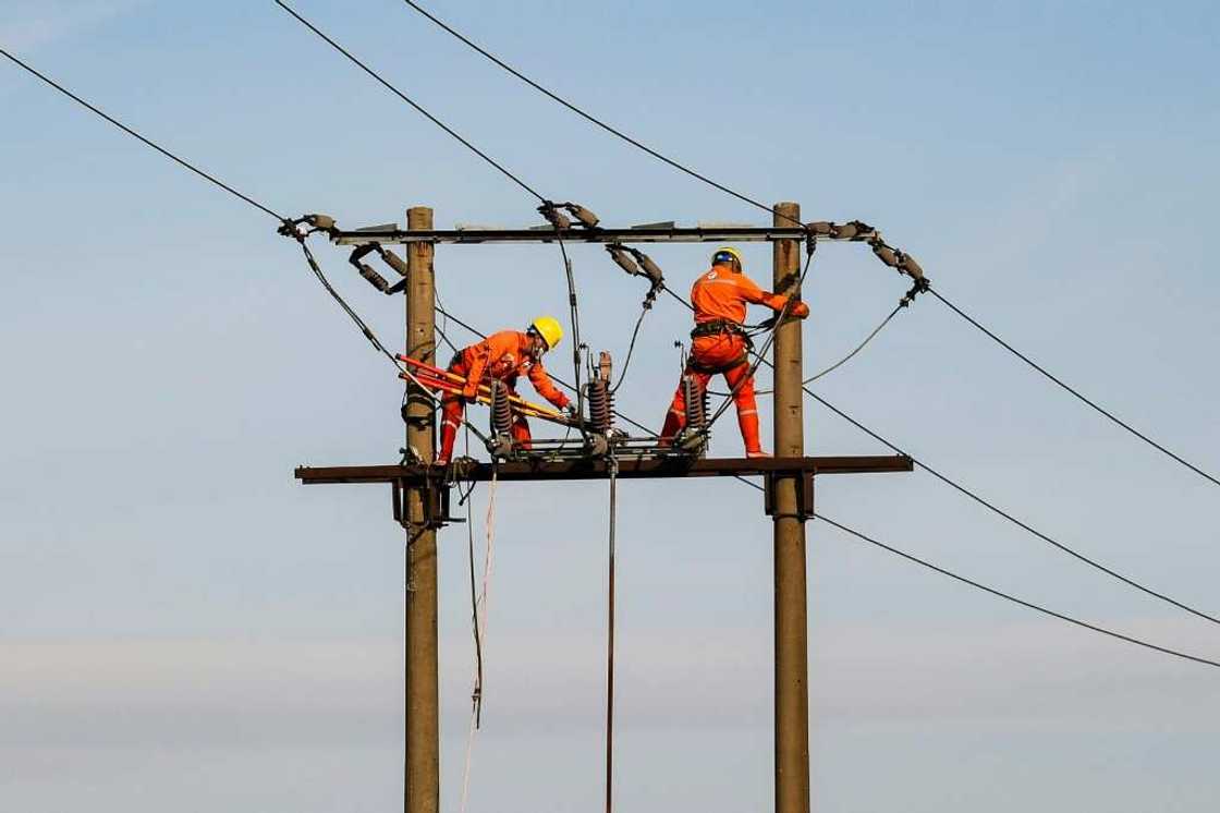 An intensely hot summer and unprecedented drought are straining energy supplies in northern Vietnam, prompting rolling blackouts and sudden power outages