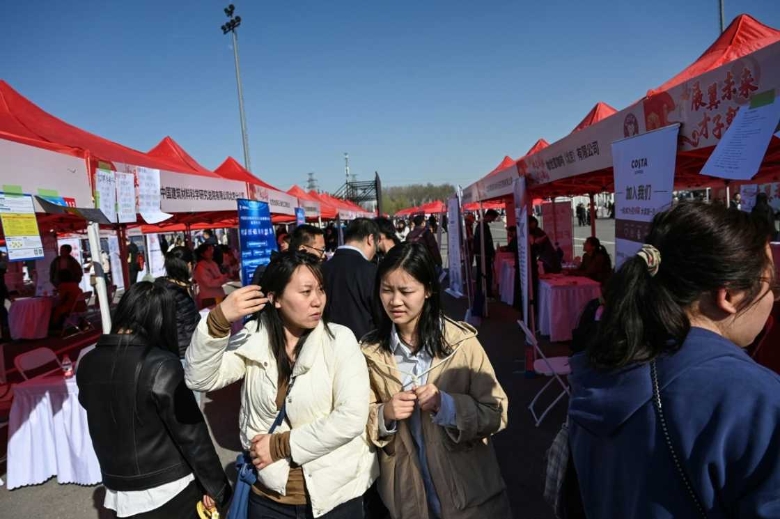 Young job seekers attend an employment fair in Beijing in March Young job seekers attend an employment fair in Beijing in March