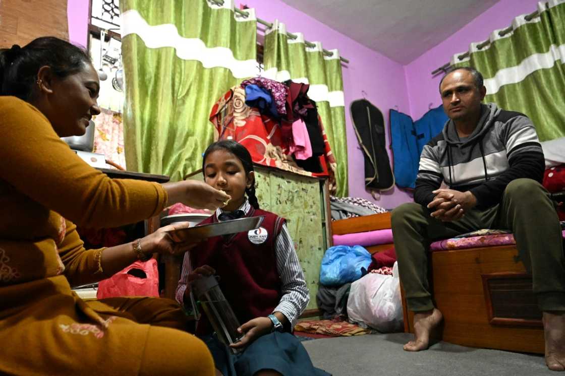 Kamal Gautam, who lost his hotel job when it was closed after being looted by rioters, told AFP he now has 'no idea how to support my family' Kamal Gautam, who lost his hotel job when it was closed after being looted by rioters, told AFP he now has 'no idea how to support my family'