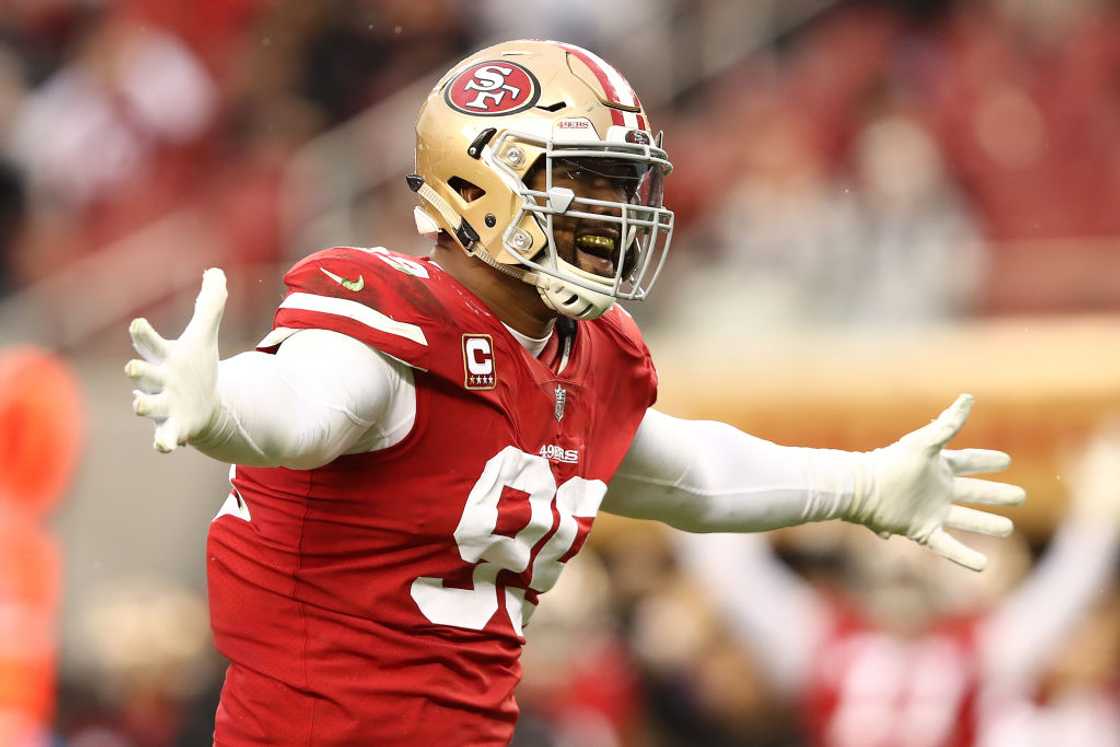 DeForest Buckner celebrates after a sack of Russell Wilson #3 of the Seattle Seahawks