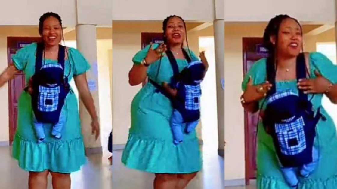 Photo of new mother carrying her kid and dancing Photo of new mother carrying her kid and dancing