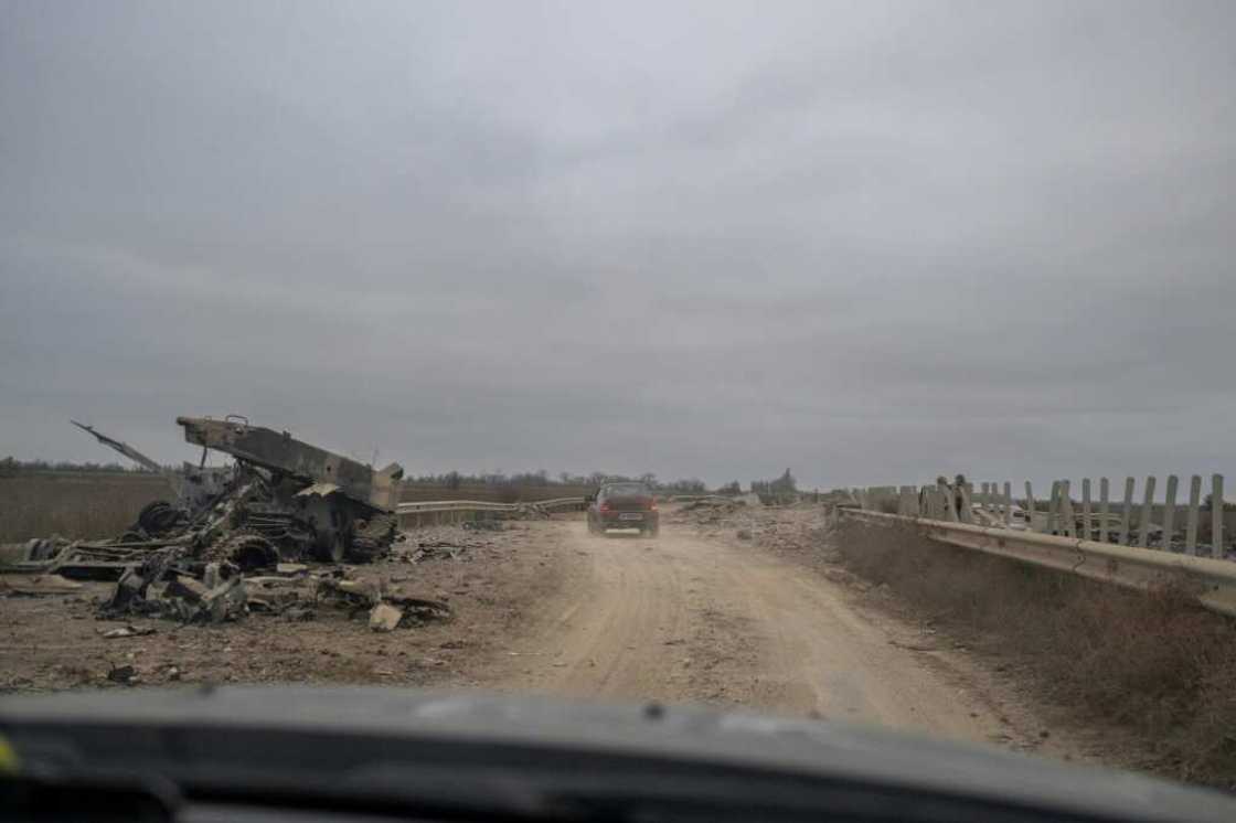 The main road into Kherson is littered with the wreckage of huge battles The main road into Kherson is littered with the wreckage of huge battles