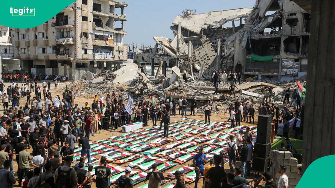 Families grieve women, children, and disabled victims killed in the Sabra neighbourhood strike.