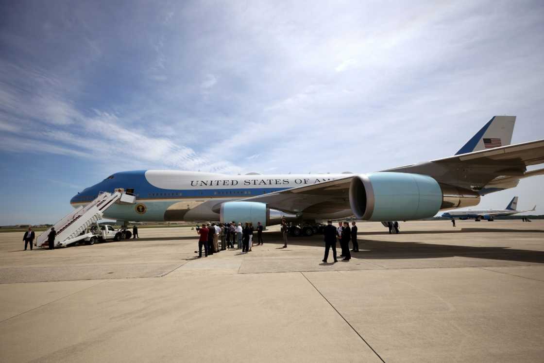 Air Force One's white and blue color scheme has become iconic Air Force One's white and blue color scheme has become iconic