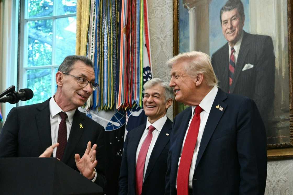 Pfizer CEO Albert Bourla (L) speaks in the White House as Medicare and Medicaid Administrator Mehmet Oz and US President Donald Trump look on during an announcement on reducing prescription drug prices Pfizer CEO Albert Bourla (L) speaks in the White House as Medicare and Medicaid Administrator Mehmet Oz and US President Donald Trump look on during an announcement on reducing prescription drug prices