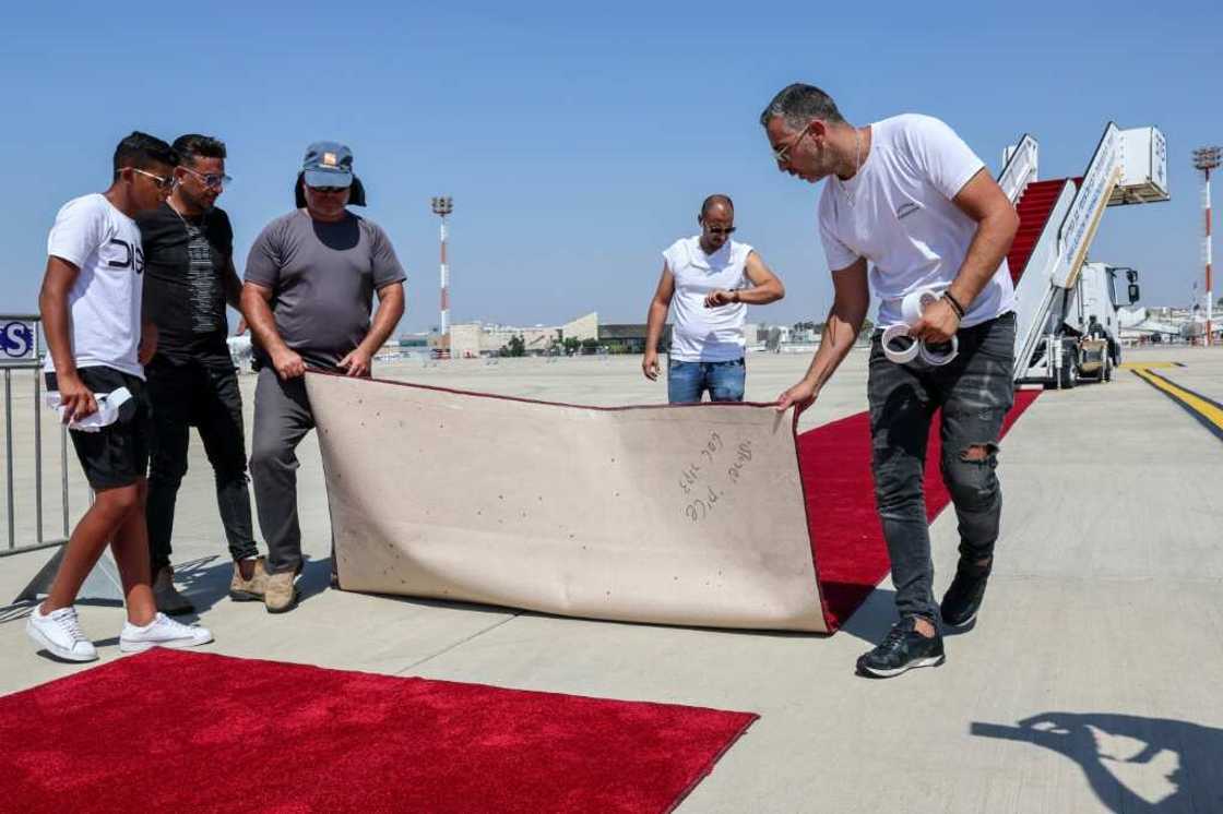 US President Joe Biden lands at Israel's Ben Gurion Airport on Wednesday, and workers have been laying the red carpet readying for his visit US President Joe Biden lands at Israel's Ben Gurion Airport on Wednesday, and workers have been laying the red carpet readying for his visit