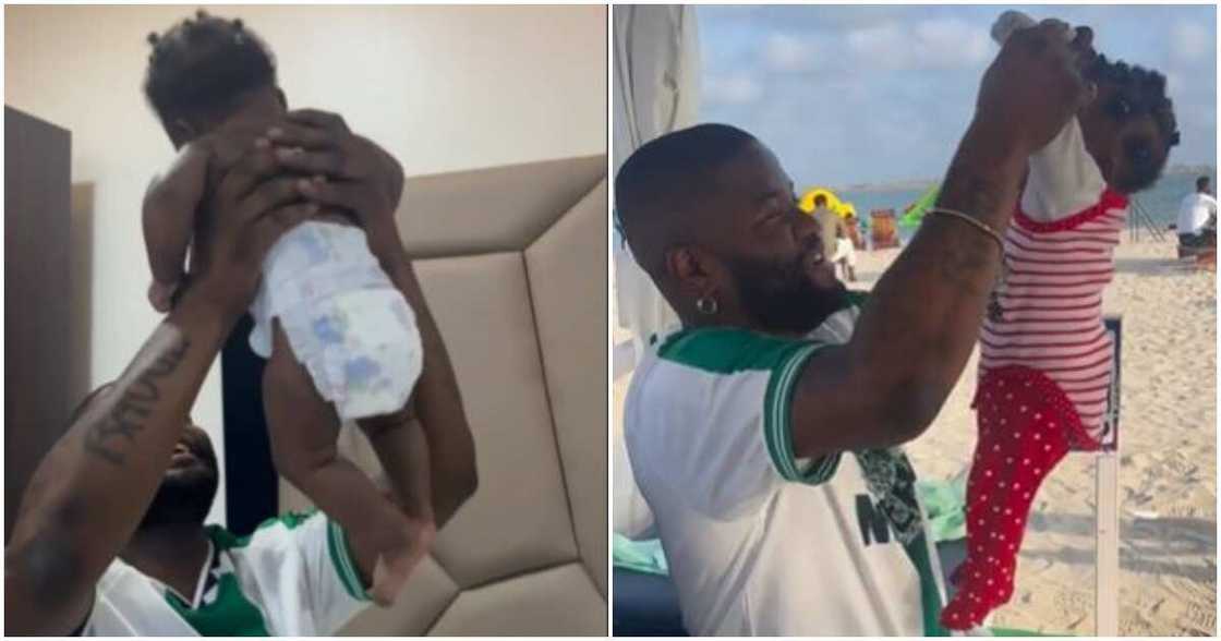Nigerian singer Skales and his daughter Nigerian singer Skales and his daughter