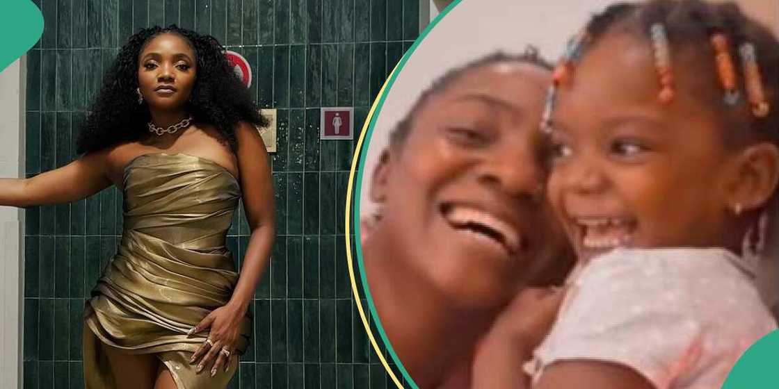 Simi's daughter Deja sings Kizz Daniel's song in adorable video. Simi's daughter Deja sings Kizz Daniel's song in adorable video.