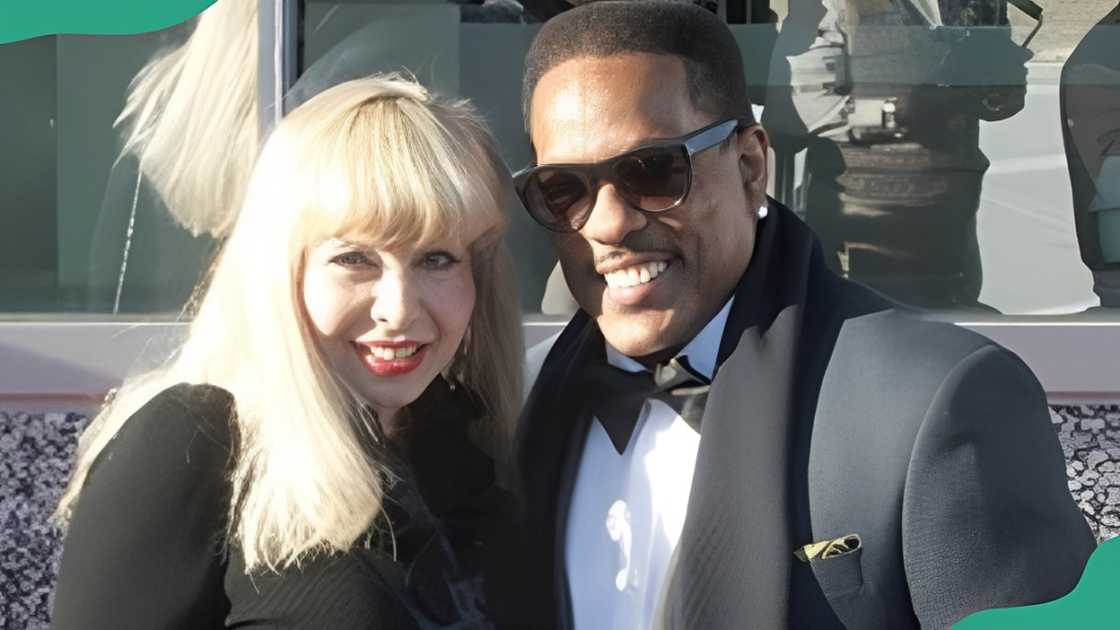 Charlie Wilson and his wife pose as they attend a past event