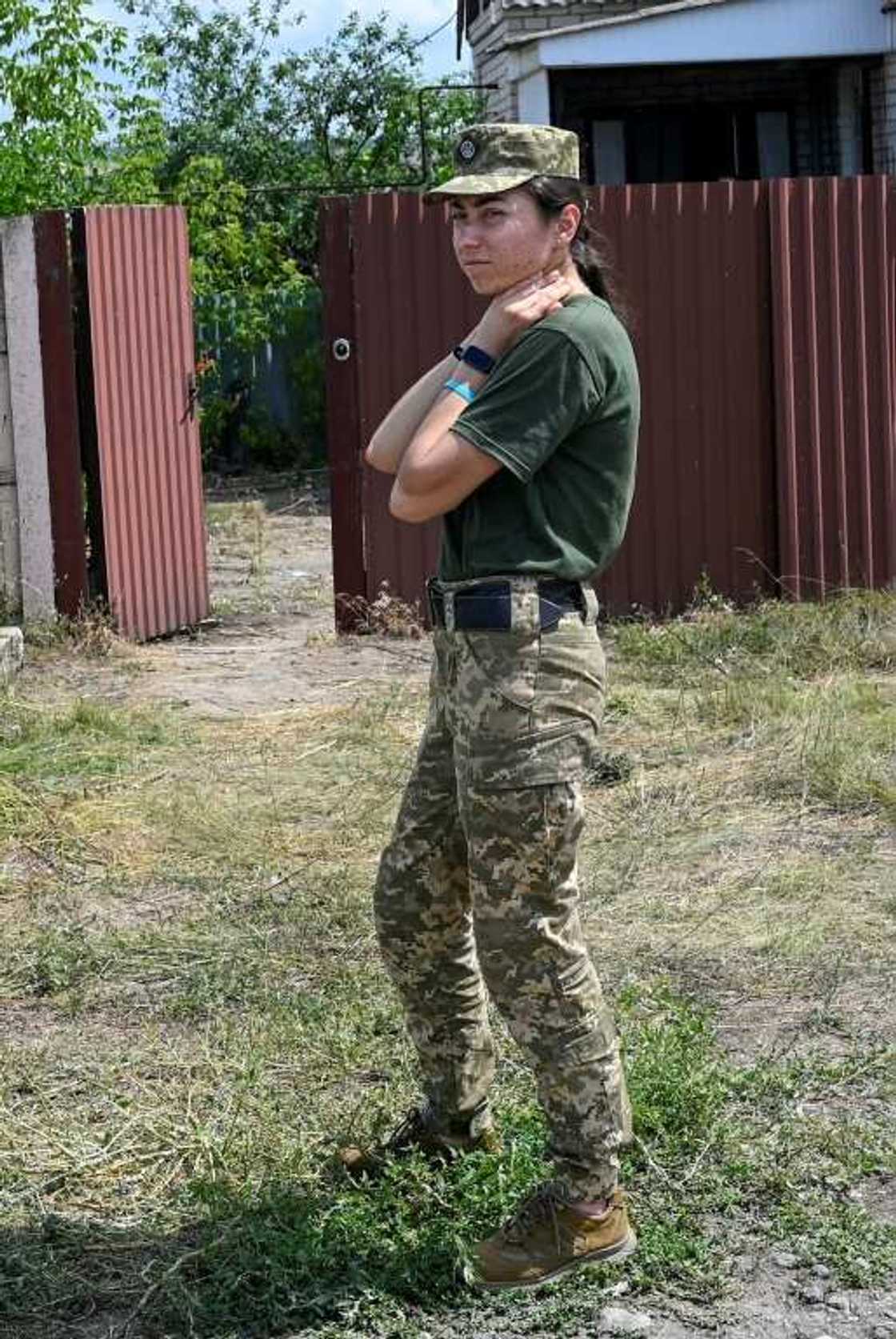 Kateryna, deputy commander of a Ukrainian army unit, never takes pictures with comrades before going to the front line -- it's bad luck Kateryna, deputy commander of a Ukrainian army unit, never takes pictures with comrades before going to the front line -- it's bad luck