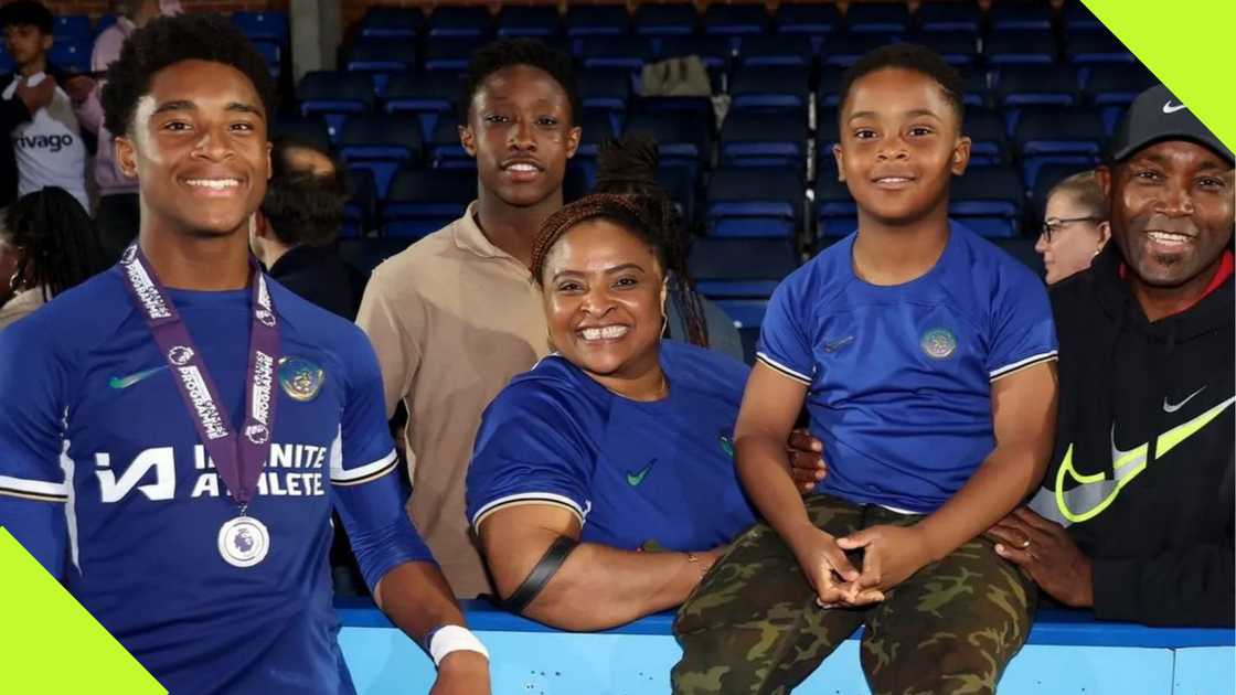 Chizaram Ezenwata with his family after winning the Premier League U15 Cup. Chizaram Ezenwata with his family after winning the Premier League U15 Cup.