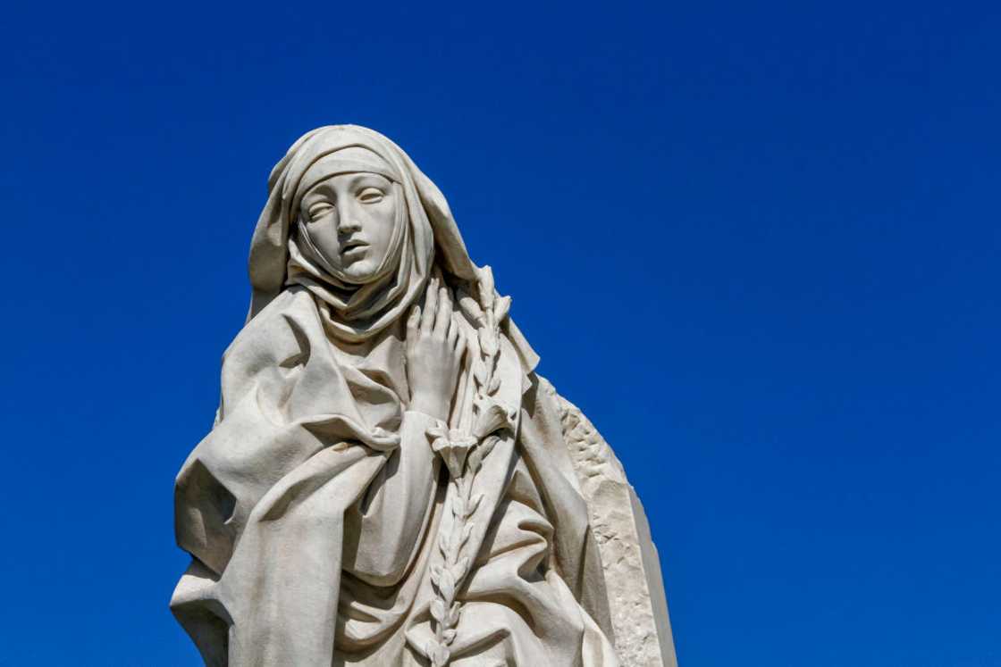 St Catherine of Siena statue in Castel Sant'Angelo's gardens, Rome. St Catherine of Siena statue in Castel Sant'Angelo's gardens, Rome.
