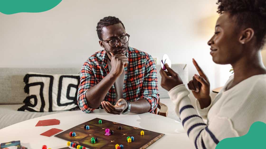 Two friends play a board game