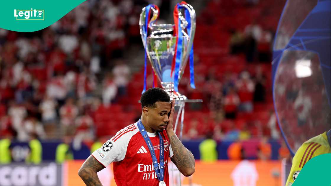 Gabriel looks dejected as he walks past the UEFA Champions League trophy. Photo by Carl Recine Gabriel looks dejected as he walks past the UEFA Champions League trophy. Photo by Carl Recine