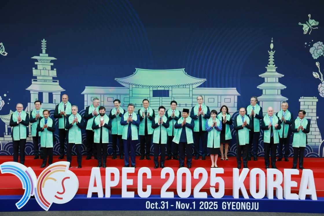 This handout photo from APEC 2025 KOREA via Yonhap taken and released on November 1, 2025 shows South Korea's President Lee Jae Myung (C) posing for a group photo with leaders from the Asia-Pacific Economic Cooperation (APEC) in Gyeongju. This handout photo from APEC 2025 KOREA via Yonhap taken and released on November 1, 2025 shows South Korea's President Lee Jae Myung (C) posing for a group photo with leaders from the Asia-Pacific Economic Cooperation (APEC) in Gyeongju.