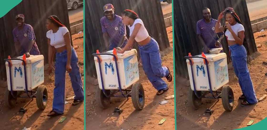 Lady collects ice cream from hawker.