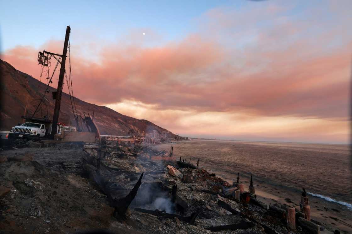 Burned-out beachfront homes destroyed by the Palisades Fire are seen along Pacific Coast Highway in Malibu, California