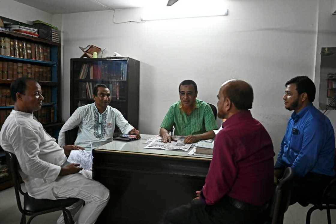 Critics of the status quo like Ayasur Rahman (C), say it's time to send the Rohingya back to Myanmar Critics of the status quo like Ayasur Rahman (C), say it's time to send the Rohingya back to Myanmar